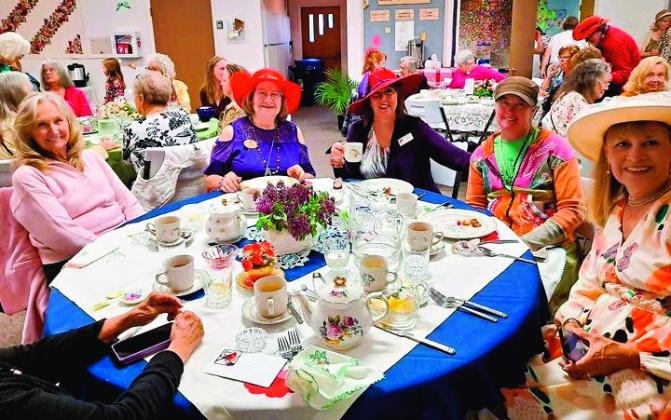 Greenhorn Valley ladies all dressed up and enjoying the formal tea to benefit the Greenhorn Valley Backpack Project. Courtesy Photo
