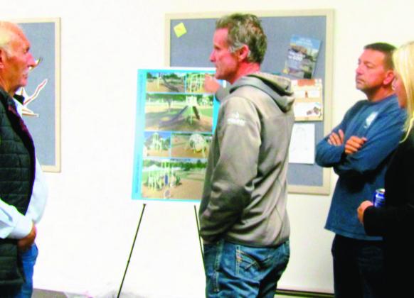 Abe Armendariz, Park Supervisor for Pueblo County Parks and Recreation, explains new playground equipment slated for Rye Mountain Park. Photo by Shirley Pigg
