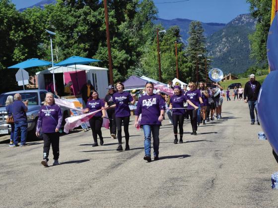 The RHS Marching Band Color Guard performed a Main Street parade at last Saturday’s event. Courtesy Photo