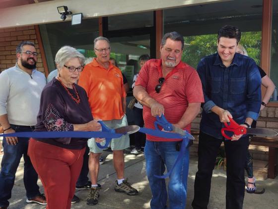 Marty Rahl, Mayor of Rye; Jim Eccher, Colorado City Metro District Manager; and Miles Lucero, Pueblo County Commissioner (L-R front) cut the ribbon celebrating Pueblo County services becoming available in Colorado City. CCMD Board Members Karim Ayoub and Ray Davis (back L-R) Courtesy Photo