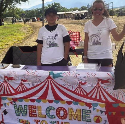 Mrs. Wang and Mrs. Pagano were happy to help with the carnival and get to see the new students Photo by Shirley Pigg