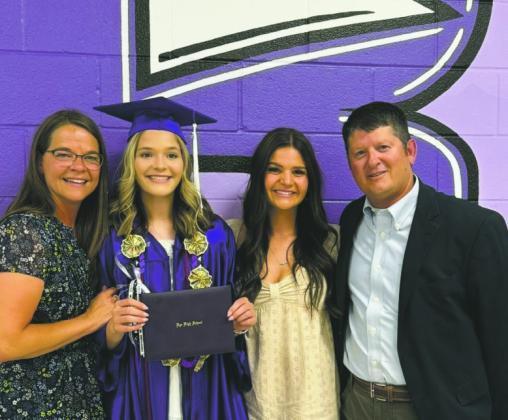 Coach Catherine Gallegos (L), daughter Morgan, daughter Lauren, and husband Mac. Courtesy Photo