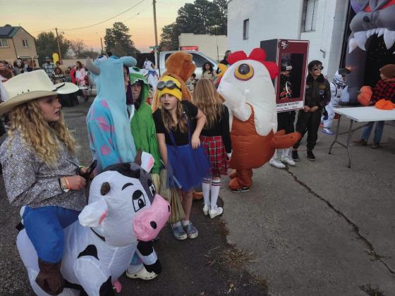 Costume Contest entrants lined up outside the Rye Fire Station for Rye Fire Protection District employees to award ribbons and treats