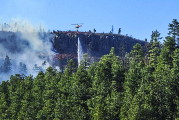 A Beulah Fire Protection helicoptor as well as approximately 90 firefighters from multiple agencies fought the Northcreek Fire. Courtesy Photo