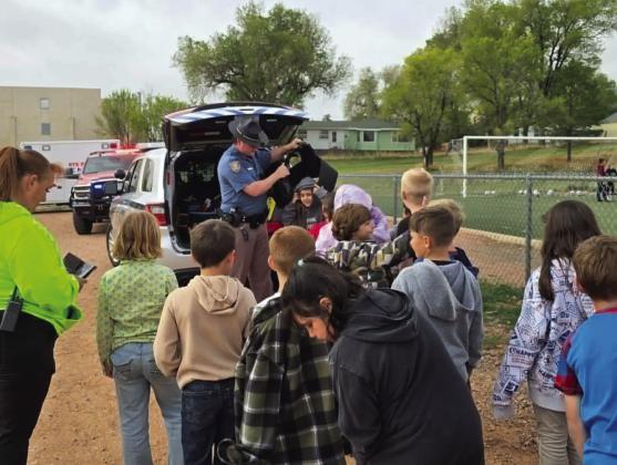 The Colorado State Patrol let the students try on some of their protective gear Photo by Shirley Pigg