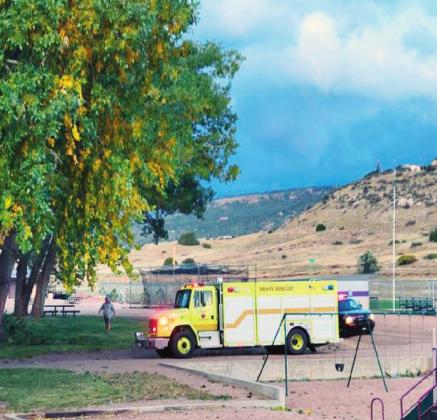 Emergency vehicles and San Isabel Electric Association personnel were on the scene Saturday to repair electric lines downed by high winds. Courtesy Photo