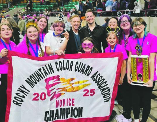 WinterGuard Banner and Trophy: (Back L-R) Miriam Peterson, Judge Michael Sulpizio, Judge Jeff Hargis, Kamilah Hayavi, Ariah Mahnke, (Front L- R) Kaydence Dawson (Co-Captain), Tennessi Payne-Carlson, Xavier Blackman, Zoey Tillery, Chloe Kasel, Kaylee Kasel (Captain) Courtesy Photo