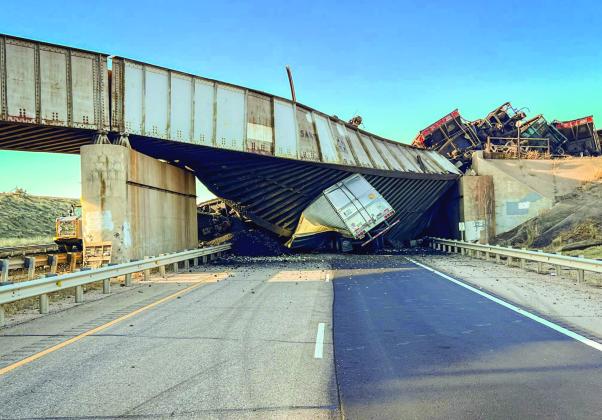 The derailment resulted in the death of a semi-truck driver when the overpass and coal cars crushed the truck he was driving. Courtesy photo
