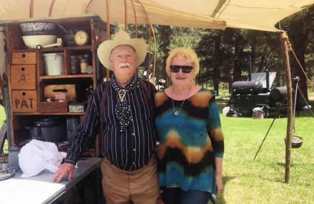 Dave and Helen Wade served lunch at the Church in the Wildwood as part of a series of 150 Year Anniversary celebrations for the Rye Home United Methodist Church. On the left is the original church building and the current building (1936). Courtesy Photo