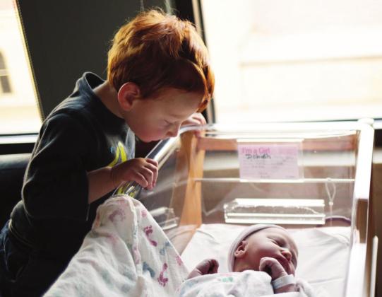2021 Year in Review - Best Photograph runner up, by Emily Colton. Entitled, “Siblings”. Photo by Emily Colson