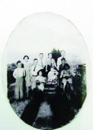 George Albert Thacker with grandchildren Courtesy Photo