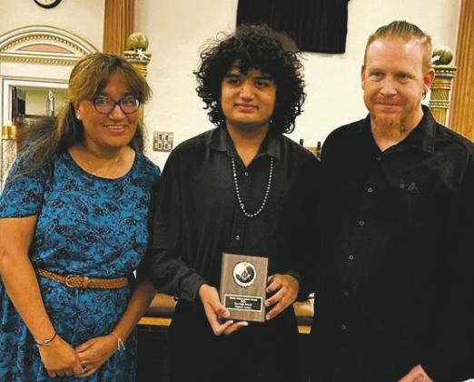 Rye High School Masonic Public-School Achievement Award recipient Micheal Amaya (center) with his parents Courtesy Photo