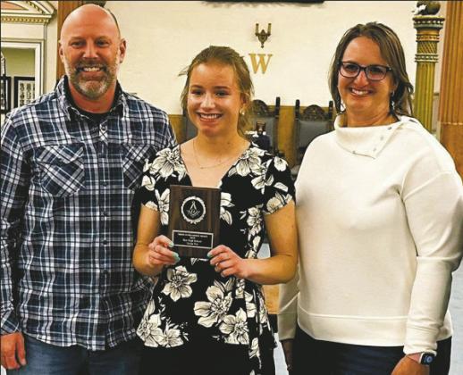 Rye High School Masonic Public-School Achievement Award recipient Taylor Pye (center) with her parents Courtesy Photo