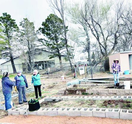 Community Garden volunteers show up to assist with spring over-See haul and get ready for memorial tributes. Courtesy Photo