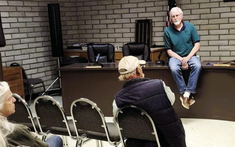 Despite only a few residents coming to take advantage of the open house with the CCMD board members, Neil Elliot and Jim Eccher spent over an hour and a half discussing issues and answering questions Photo by Shirley Pigg