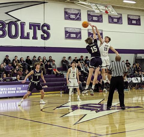 Rye High’s Codah Graber #15 shoots over CSCS player in the contest January 17 on the home court. Courtesy Photo