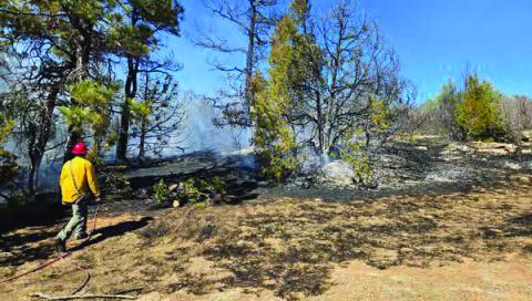 A fire, possibly caused by sparks from cutting a metal pipe, was quickly taken care of due to team work of several fire fighting agencies. Courtesy Photo