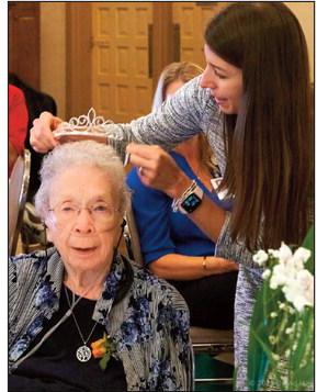 Nicole from Sangre de Cristo Community Care places the crown on Dorothy Ohlsen the 2023 Silver Queen.. Photo courtesy of David Hayden Photography