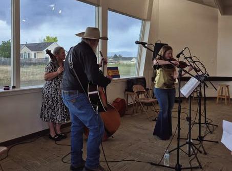 Part of the Ryan fiddling family- Don,Charlotte, Max, and Joy. Courtesy photo