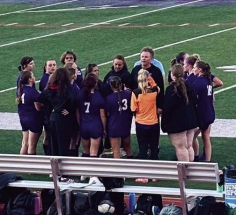 With a 3- 2 lead at half - time, Coach John Crowell gathers his team for second half instructions. Last year Fountain Valley beat the Thunderbolts 5- 0 Photo by Jack Graham