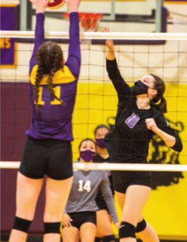 Photo by Sue Barcus Abbi Sammons #10 sliding her hit past Fowler’s defense.