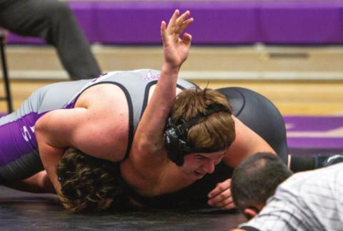 Devin Samuelson wrestling at 220 on Friday night, Dec. 17, during a dual meet with John Mall and Mancos H.S. pinned his opponent from John Mall. Photo by Sue Barcus