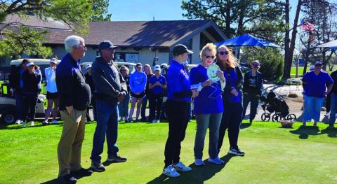 Photo by Shirley Pidd The Rye High School girls' golf team and some of their parents gathered near Ann Bush, Prim Ivan, and Greg Bailey to honor Madeline Mellers memory