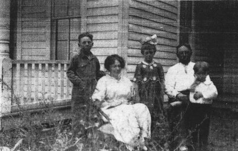 Kenneth Lena Helen Kermit Karst in front of Doze House, built 1867 Courtesy Photo