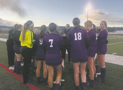 Coach Crowell rallies the girls soccer team against Lamar. Rye tied the 3A powerhouse 2-2 on their home field. Courtesy Photo