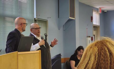Jeffrey Dawson (L), Engineering Manager for Front Range Passenger Rail and Colorado Department of Transportation, and Luis Lopez, Front Range Passenger Rail Director, explain the proposed route and services of the train at a meeting at the Pueblo Photo by Shirley Pigg
