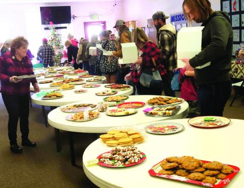 All kinds of cookies, candies, and baked goods filled the tables at the Christmas Cookie Walk held at the Rye Home United Methodist Church on Saturday, December 13. Photo by Shirley Pigg