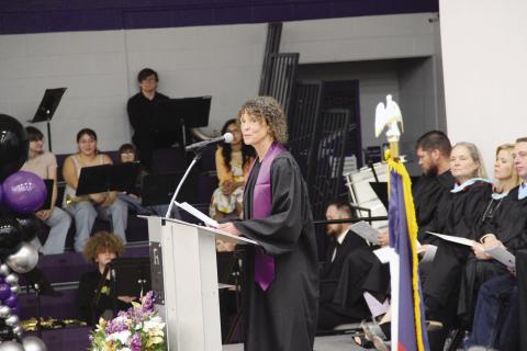 Educator and class sponsor Karen Hopkins shares her wishes with the Rye High School class of 2025. Terry Kraus