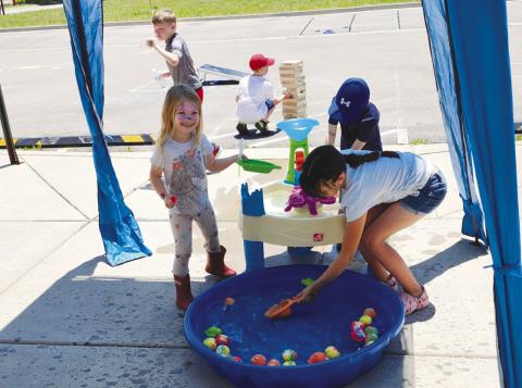 Participants of the Summer Reading Kickoff Party enjoyed games and lunch before selecting books to read Photo by Shirley Pigg