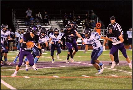 Quarterback Nolan Schauer rolls around right end against Trinidad, a game won by the Thunderbolts 47-0. Photo courtesy of Karen Rochester