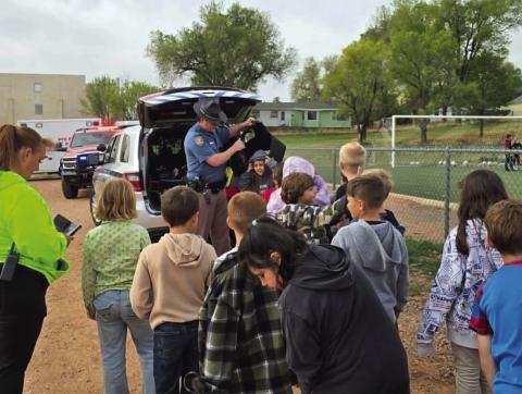 The Colorado State Patrol let the students try on some of their protective gear Photo by Shirley Pigg