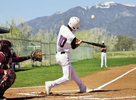 Will Hamler drives the ball in to left field for a hit. The entire Rye team seemed to gel last week with three impressive victories. Photo by Karen Rochester