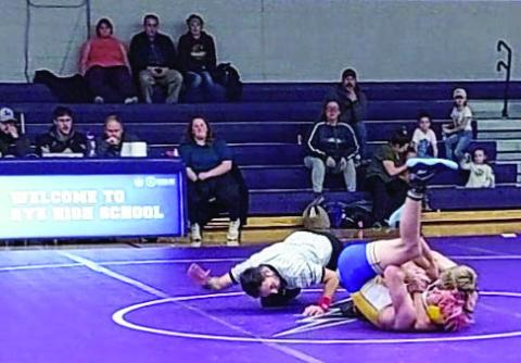 Hyrum Peterson (Rye) has a cradle pin against his opponent from Dolores Huerta Prep on 12-15-2022 Courtesy Photo