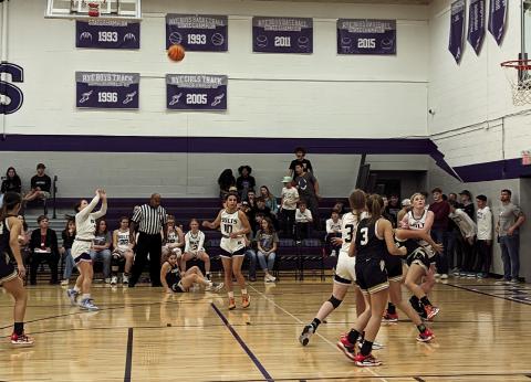 Rye High’s Gracie Briggs (#30 ) takes a long shot against Vanguard on Saturday. Photo by Deb Straub