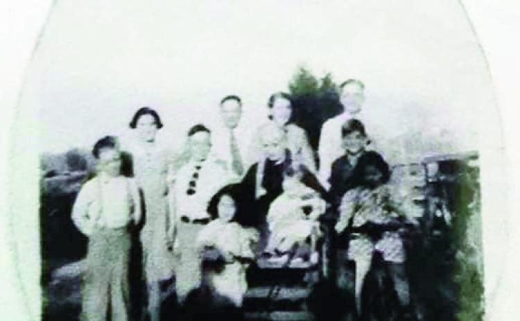 George Albert Thacker with grandchildren Courtesy Photo