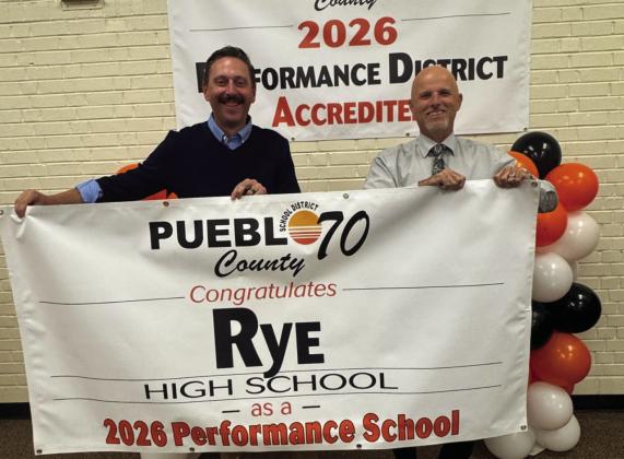 RHS Principal Matt DeJong and Pueblo County School District 70 Interim Superintendent Bob DePietro display 2026 Accreditation Banner . Courtesy Photo