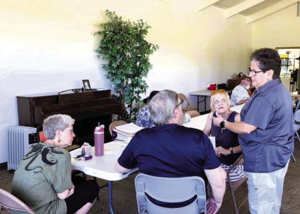 Dina Godinez, Pueblo Area Agency on Aging Program Coordinator, took time to answer one-on-one questions about the organization and the services they offer. Courtesy Photo