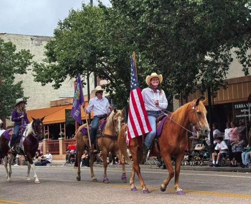 RCC Saddle Club proudly took to the streets of Pueblo to participate in the State Fair Parade. The American Flag is carried by Sydney Hecox Courtesy Photo