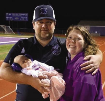 Coach Connor Pigg, wife Maddie, and their daughter Kennedy Rose Pigg. The couple are expecting twins in November. Courtesy Photo
