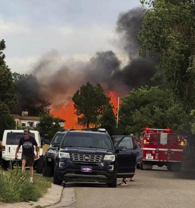 Sunday, June 21, brought evacuation orders to the Applewood Estates community in Colorado City due to a Highway I-25 fire that blew into the area. Firefighting efforts brought the fire under control quickly but several homes were destroyed by the blaze. Courtesy Photo