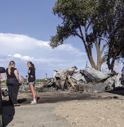 Residents at Applewood begin to search for answers to the devastating loss of homes and neighborhood. Photo by Terry Kraus