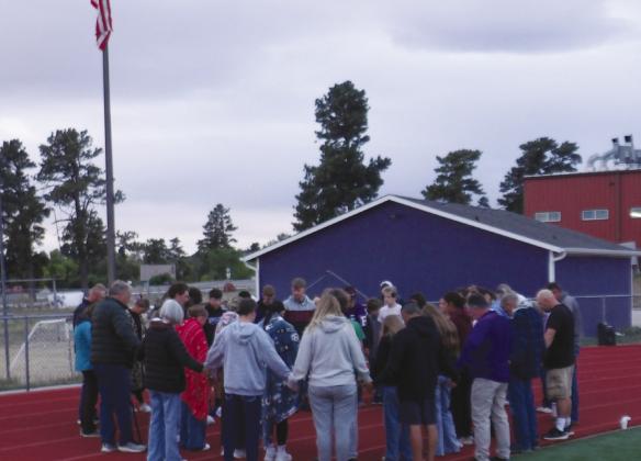 Fifty students, teachers and community members gathered around the flag pole at Rye High School to pray for the nation, Colorado, the community and the local schools. For more information read this week's Viewpoint . Courtesy Photo