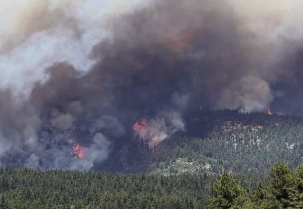 Strong winds have kept high plumes of smoke rising since the beginning of the Aspen Acres Fire. Courtesy Photo