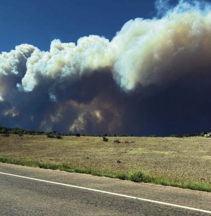 Smoke from the Aspen Acres Fire from I-25, now 15% contained due to a full week of firefighting efforts withinvolvement from the Alaska Complex Incident Management Team Courtesy Photo
