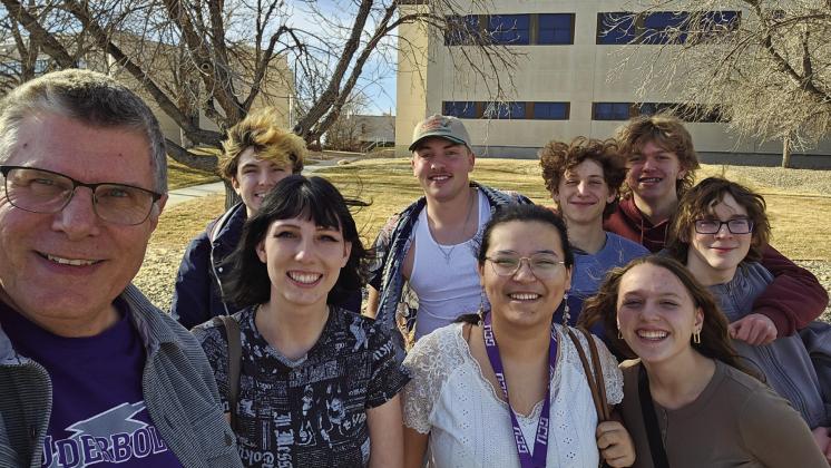 Rye High School teacher Dave Ressel with students at he RHS Knowledge Bowl team at the regional meet in Pueblo Courtesy Photo