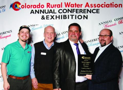 CCMD District Manager Jim Eccher (second from R) receives Manager of the Year award from the Colorado Rural Water Association. Courtesy Photo